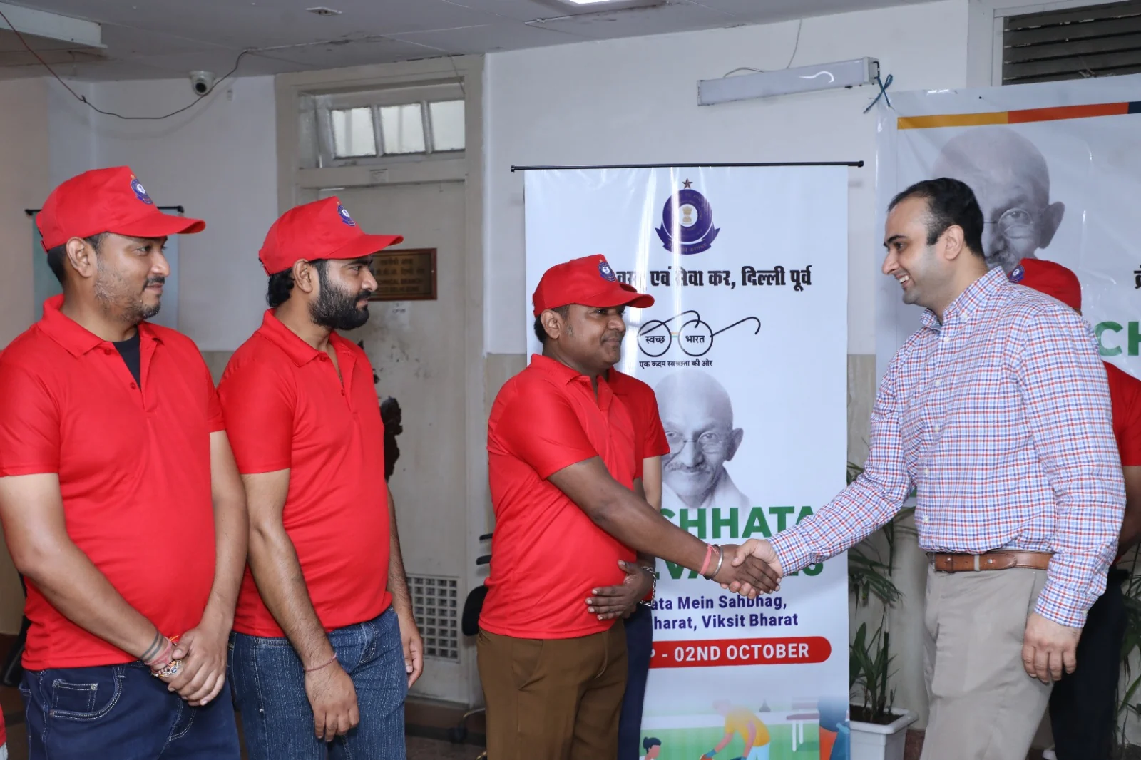 A frontline worker being welcomed during the SafaSoch cleaning skills engagement